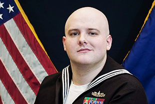 Navy esports player Brandon Chandler poses for an official Goats and Glory headshot