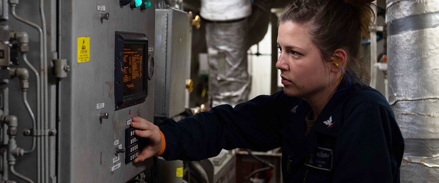 A United States Nay Machinist’s Mate conducts maintenance checks aboard the USS Truxtun.
