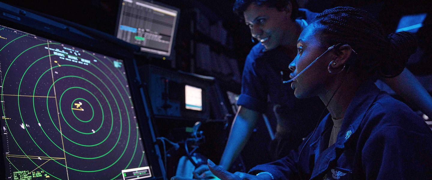 United States Navy Air Traffic Controllers man the approach control aboard the USS Wasp.