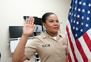 Official United States Navy headshot of Jackey Smith, Senior Chief and Mass Communication Specialist