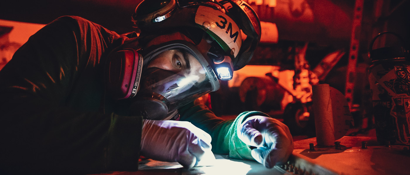 A United States Navy Sailor embarks on mechanical training while working to repair the surface of a Navy vessel.