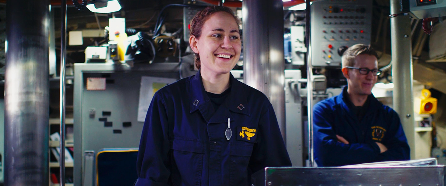 Two Nuclear Propulsion Officer Candidates working in a nuclear-powered submarine.