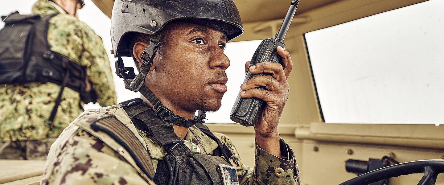 Navy Reserve Sailor in vehicle.