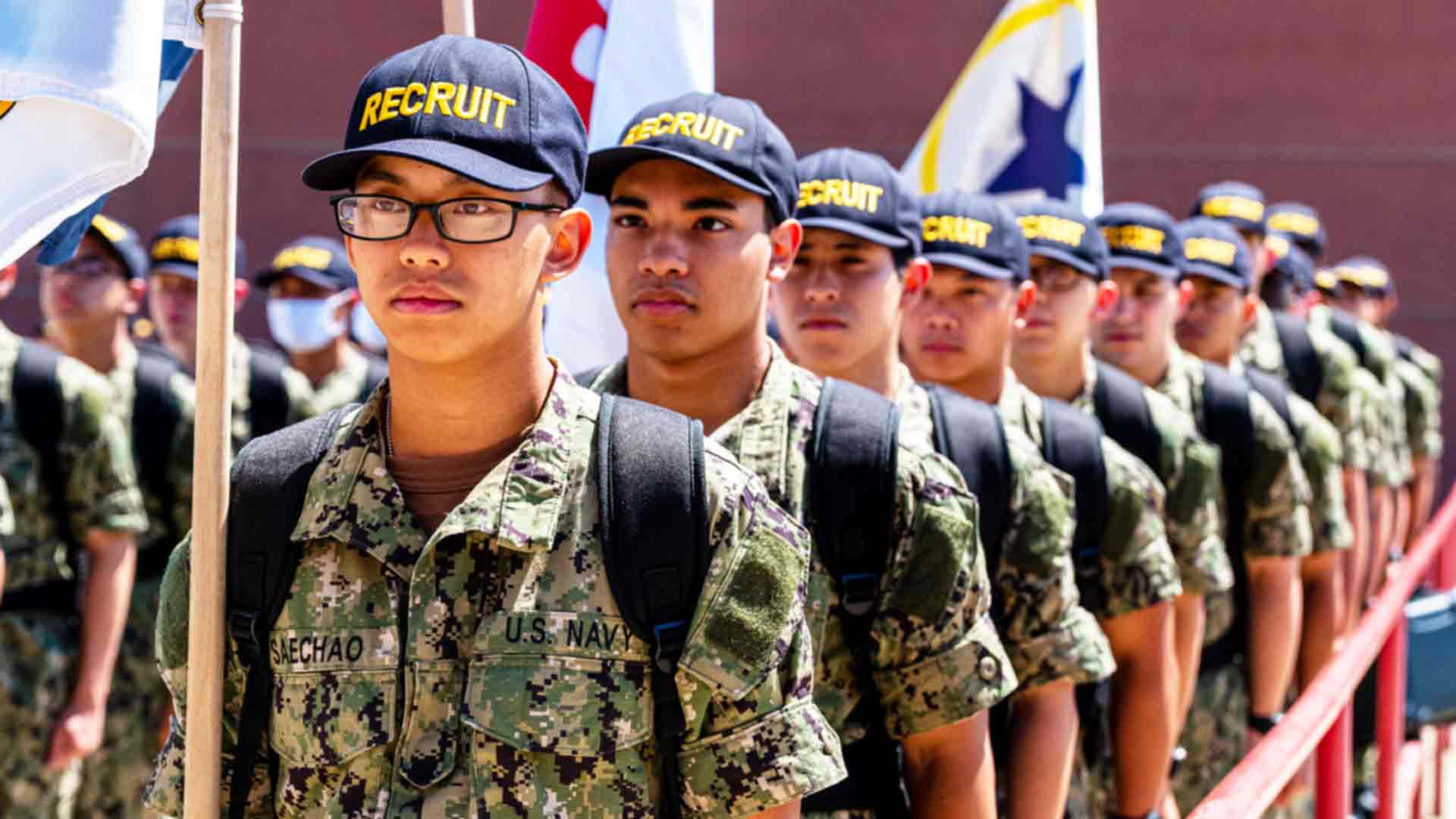 Navy recruits march at Navy boot camp in Great Lakes, IL