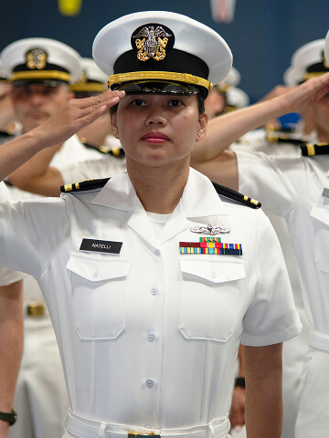 A U.S. Navy Officer salutes.