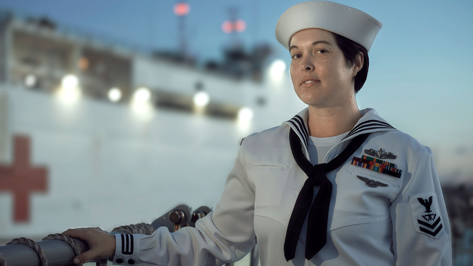 Natalie Tardif, U.S. Navy fire controlman, in full Navy uniform attire