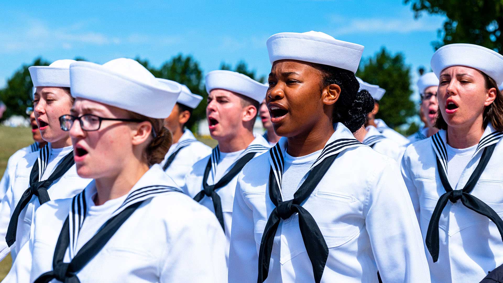 Navy Sailors recite a cadence while marching at Recruit Training Command, or Navy Boot Camp, in Great Lakes, IL. 