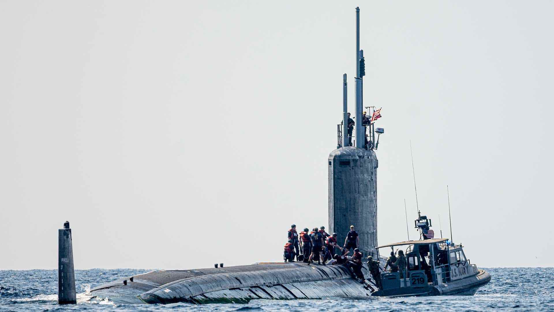 A U.S. Navy patrol boat from Coastal Riverine Squadron (CRS) 1 transfers supplies to the USS Texas (SSN 775), a Virginia-class fast-attack submarine.