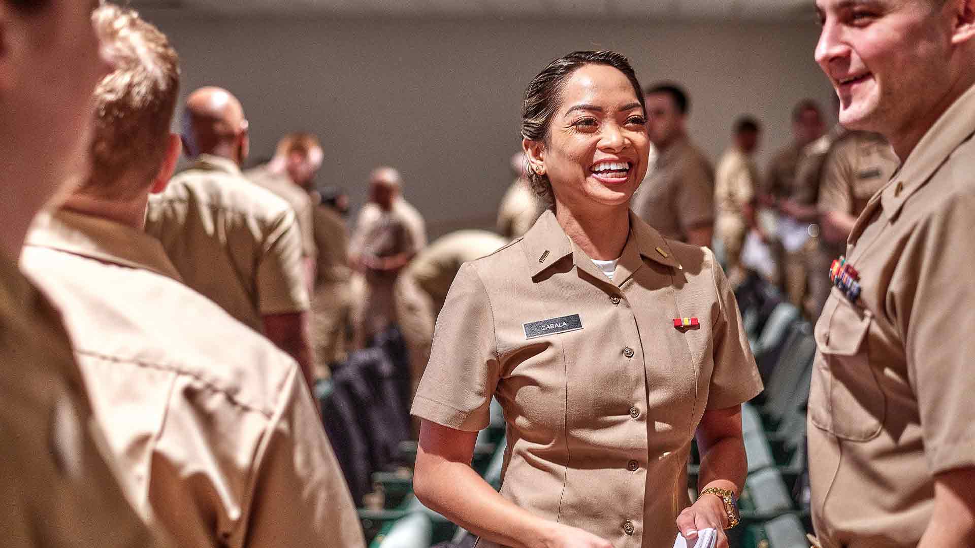 Navy Reserve Public Affairs Officer Ensign Liberty Zabala Talks With Fellow Sailors At Officer Development School