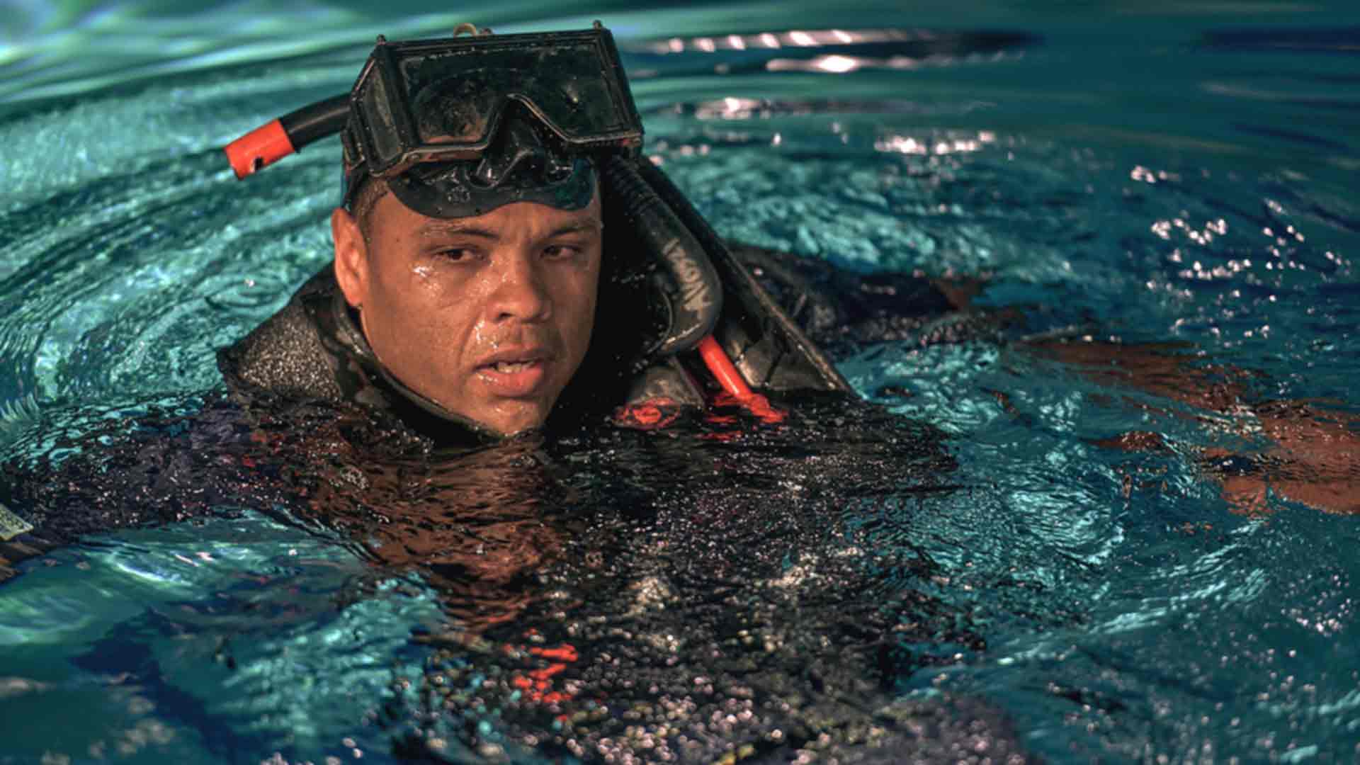 United States Navy Aircrewman Esmelin Villar catches his breath during Search and Rescue Swimmer training.