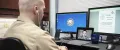 A U.S. Navy Human Resources Officer hosts a virtual video chat to speak with a potential recruit about career opportunities in the Navy.